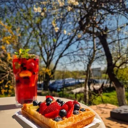 Domy W Ogrodzie - Riverfront Cabins * Poznań