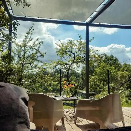 Domy W Ogrodzie - Riverfront Cabins Poznań