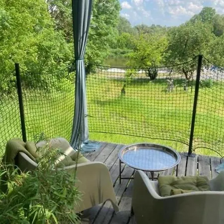 W Ogrodzie - Riverfront Ferienhaus *